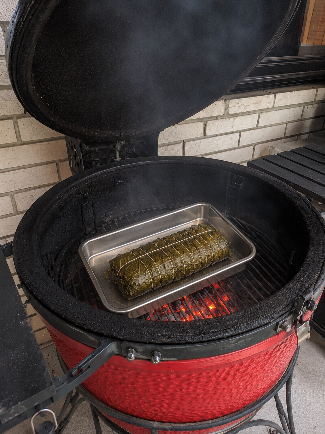 Salmon wrapped with grape leaves